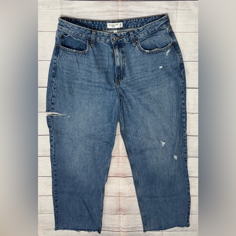 Distressed Blue Denim Jeans